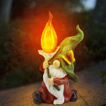 nain de jardin géant et sa flamme lumineuse